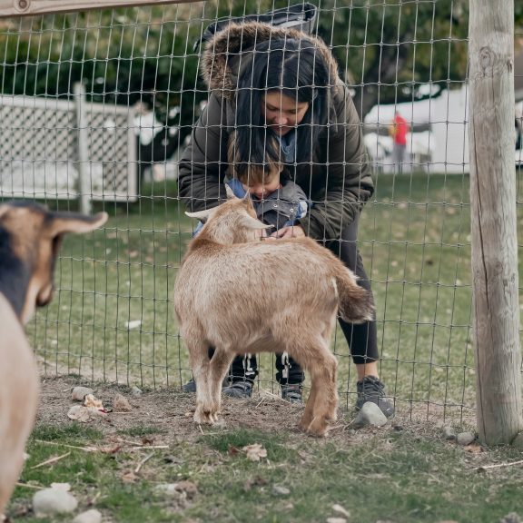 mother and child at a family farm park